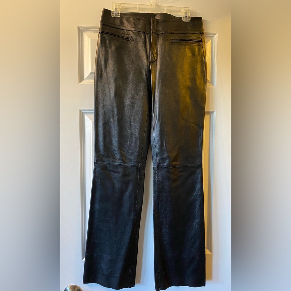Gucci black real soft leather pants with silver Gucci logo detailing. Nwt sz 42.